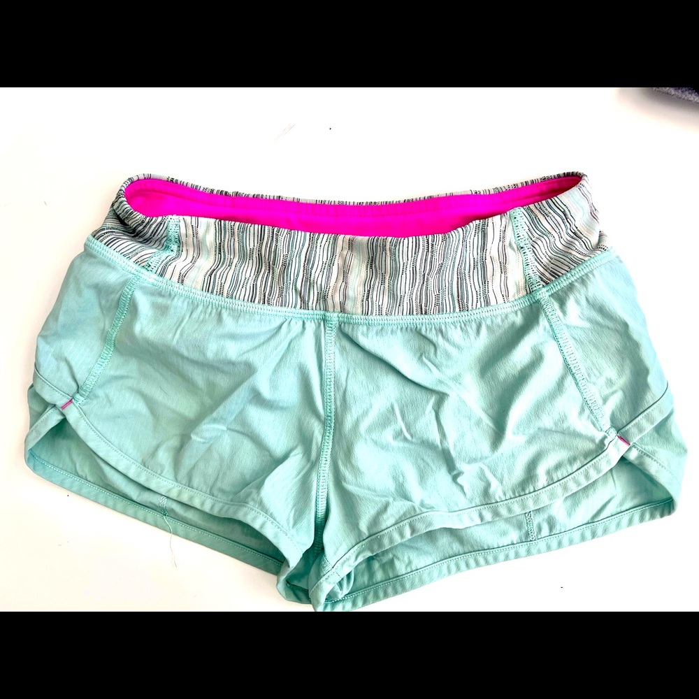 Girls mint green Ivivva shorts. Size 8